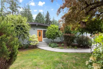 Lush gardens create a private sanctuary.