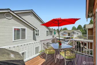 Large deck with plenty of room for a BBQ Grill & table.