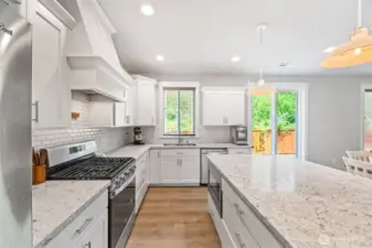 Huge kitchen island with built in microwave.