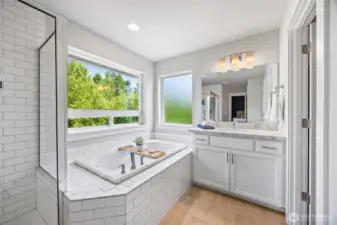 Soaker tub in primary bath.
