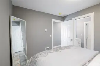 Primary bed with enterance to the Jack and Jill bath.
