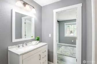 Upper floor bath with entrance to secodary bedroom.