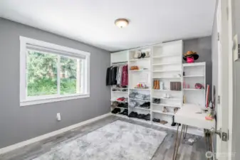 Upper floor secondary bedroom. Shelves are removable.