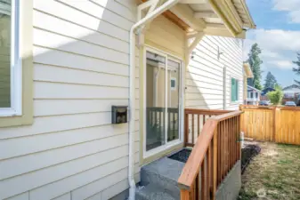 Side entrance for the main floor unit.