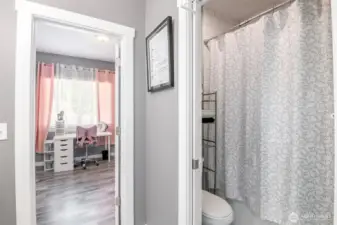 Seperate tub and toilet on the main floor.