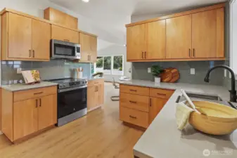 Amazing open kitchen with new cabs, quartz counters, SS appliance my oh my!