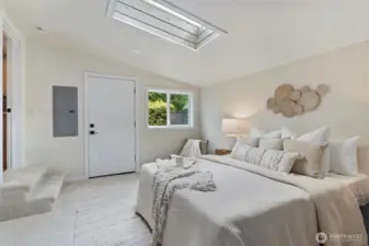 Vaulted ceilings, skylight and own entry door