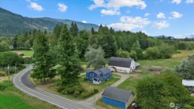Enjoy peaceful country living on this spacious level 10-acre Farm!