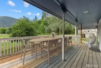 Large deck off of the family room w/ steps down to the yard. Virtually staged.