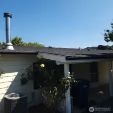 Newer roof, gutters and downspouts