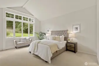 Tall vaulted ceiling, views of the backyard and French doors to the sunroom.