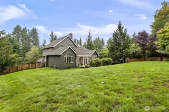 A shy 1/2 lot with a gate at back for trail access.