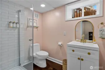 Bathroom 2 on the lower level is newly constructed. It featuers a nice glass shower.
