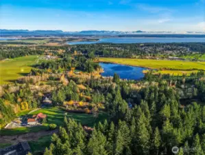 Overview Looking East over Lakes, Farms, and Port Susan~