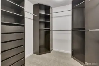 One of two walk in closets in primary bedroom