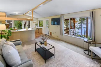 Living room looks out onto a filtered view of the water.