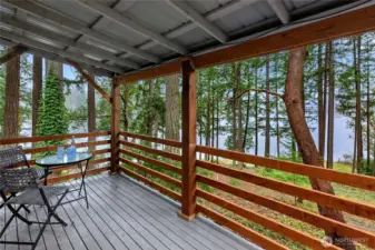 Covered Deck off of the Front of the house, to the front door.