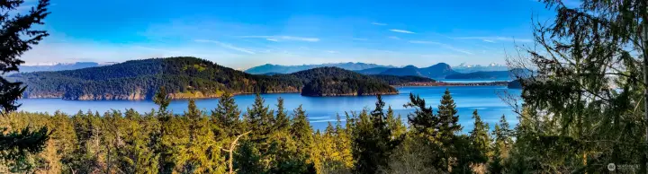 View looking east at 60' elevation.  Mt. Erie and the snow covered North Cascade Mountains can be seen in the distance.