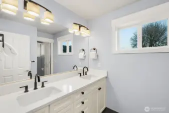 Beautifully updated full bathroom upstairs with quartz countertops!