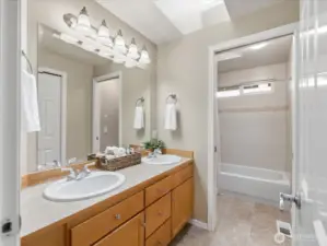 Upstairs bathroom with flexible layout for convenience and privacy.