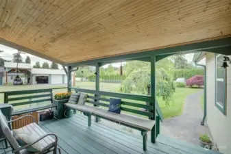 This is a front porch!  Imagine sipping your favorite beverage all year long here!