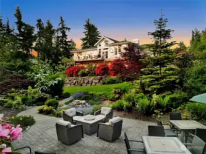 Built for entertaining.   Three paver patios, two powered water features and low voltage landscape lighting throughout the professionally landscaped estate.