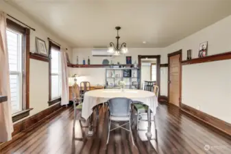 Dining Room in Unit B. The door on the right is a storage closet and the kitchen is straight ahead.