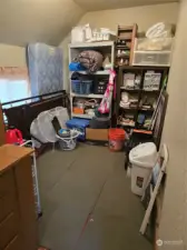 This is a large storage/pantry area off of the kitchen in Unit B.