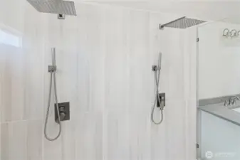 Two rain shower heads to enjoy luxury showering.