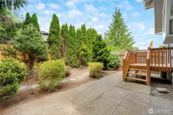 Private, fenced backyard offers perfect entertaining space, play area & convenient dog run.