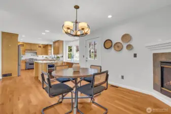 Dining area off the kitchen with gas fireplace.