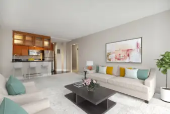 Large living room with southern exposure.  Virtually staged living room.