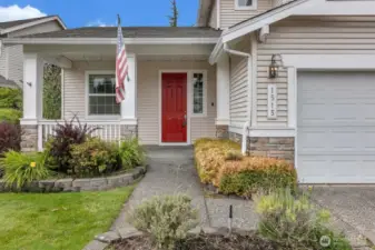 Lovely landscaping welcomes you to this well maintained home
