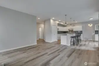 Spacious family room open to island kitchen