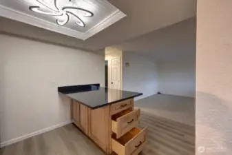 Completely remodeled kitchen with new lighting, flooring, cabinets, counter tops, appliances, fixtures and paint.