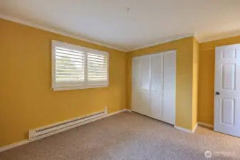 Bedroom #2 with large closet and closet systems already installed. Also new paint and carpet