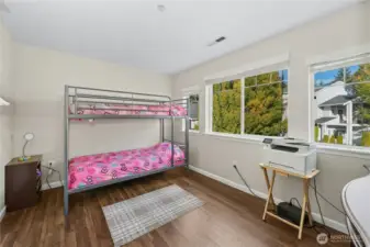 Bedroom #1 with large walk-in-closet on the left.