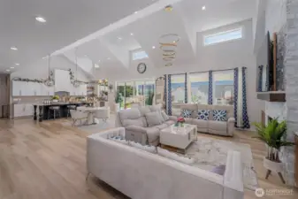 Living room, eating area and kitchen with breakfast bar