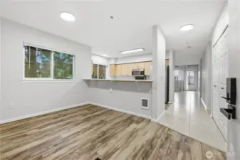 Open feel with the dining area subtly separated from the kitchen.