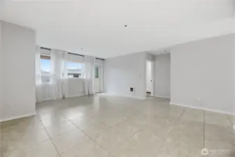 Through the living room you will find access to the to a private patio.