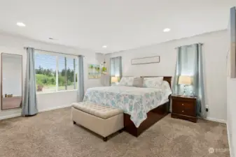 Retreat to the epitome of relaxation and rejuvenation in the large primary bedroom.