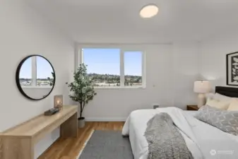 A serene retreat with stunning views from your bedroom window. This space is bathed in natural light, offering a cozy yet contemporary vibe to unwinding after a long day.