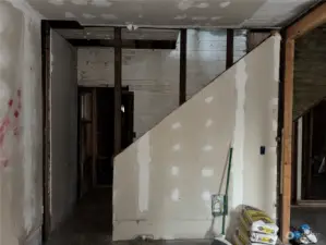 Stairway and entry to bedrooms, utility room, bathroom