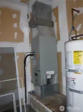 Heat pump/hot water tank in garage