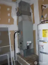 Heat pump/hot water tank in garage