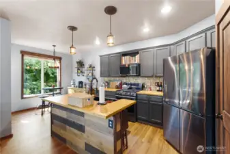 Kitchen with Island featuring Butcher Block Counter Tops!