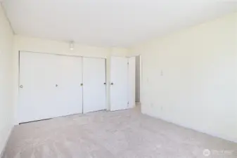 Primary bedroom with large closet.