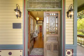 Stained-glass front doors and accents throughout the home