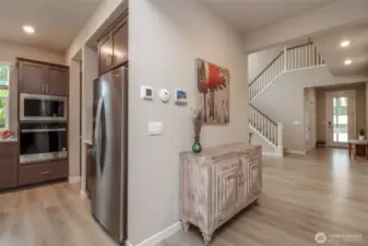 Smart panel off the kitchen. Control home security system and remote control of lights.