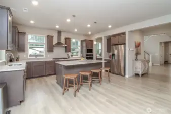 Open layout kitchen with extra window for light.